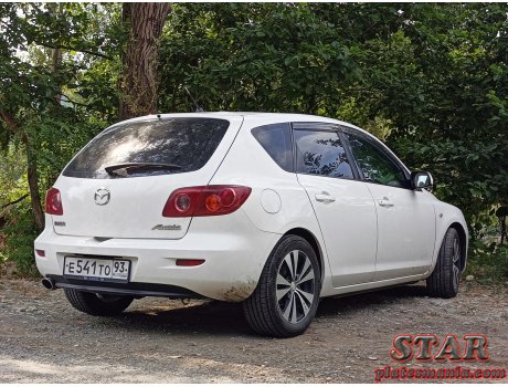 е541то93, Mazda Axela