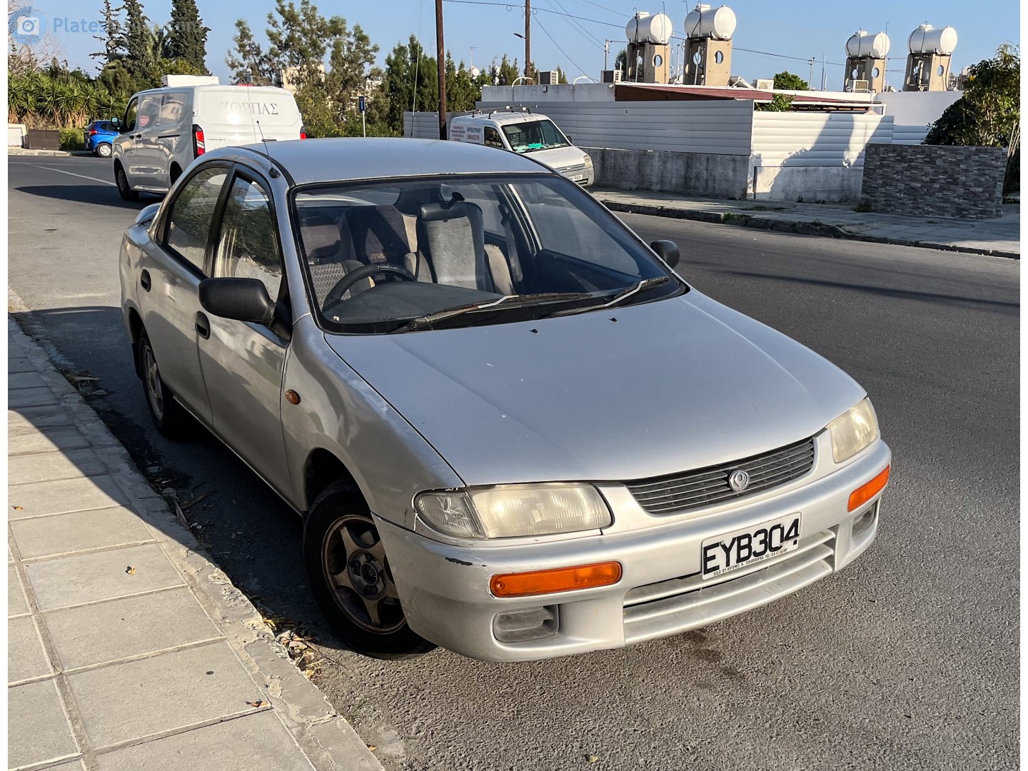 EYB 304, Mazda Familia 7th gen Sedan (BH), 1994–1998
