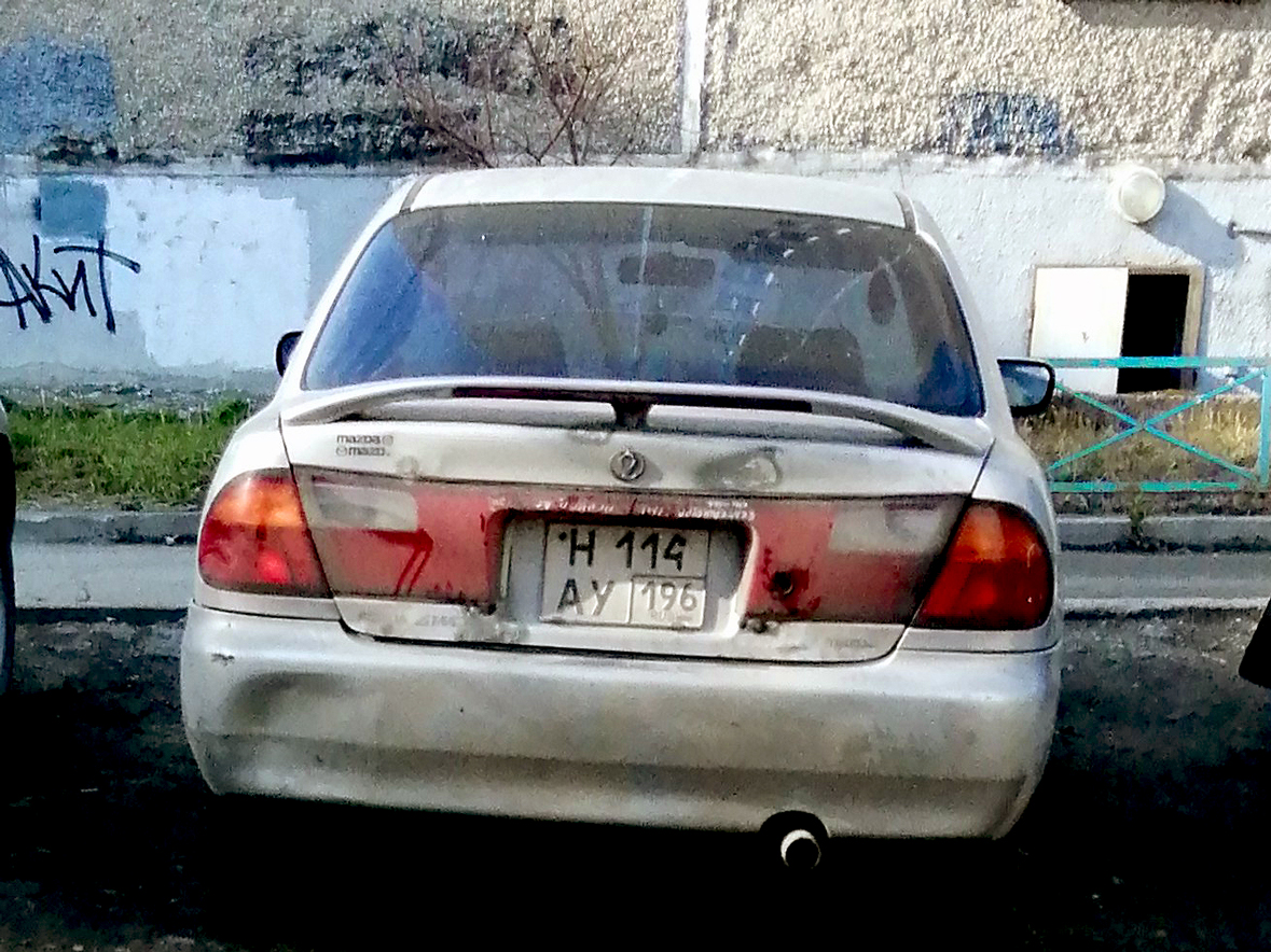 н 114 ау 196, Mazda Familia 7th gen Sedan (BH), 1994–1998