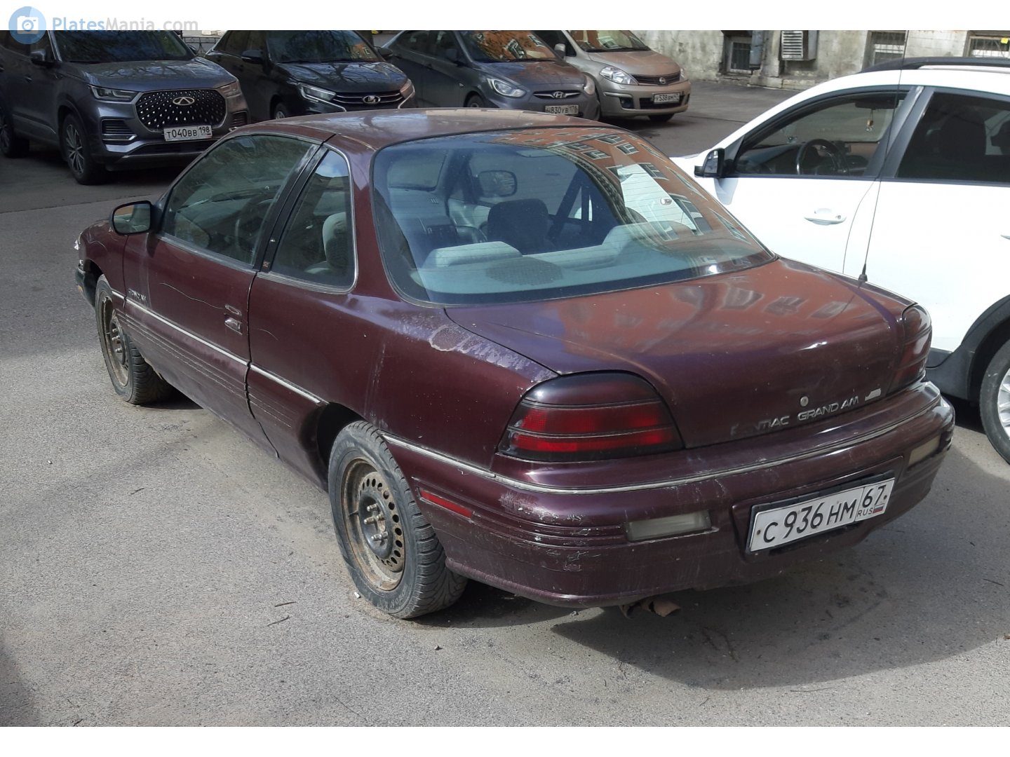 с 936 нм 67, Pontiac Grand Am 4th gen 2-door Coupé (N-body), 1991–1995