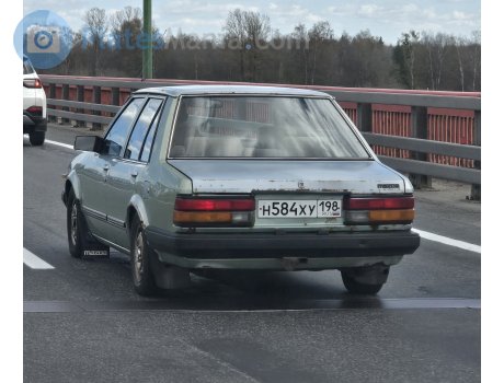 н584ху198, Mazda 323