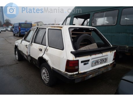 11 696-20 KB, Ford Escort