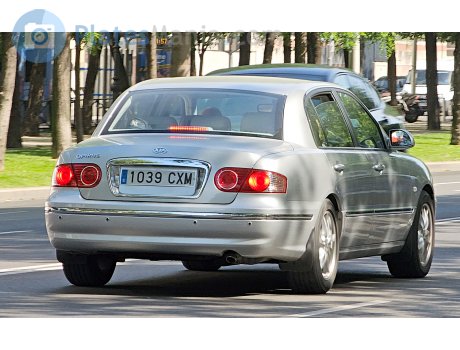 1039 CXM, Kia Opirus