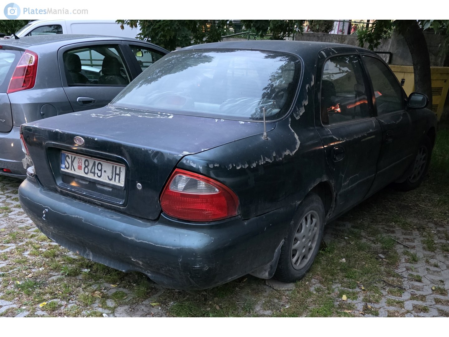 SK 849-JH, Kia Clarus 1st gen Sedan (GC), facelift, 1998–2001