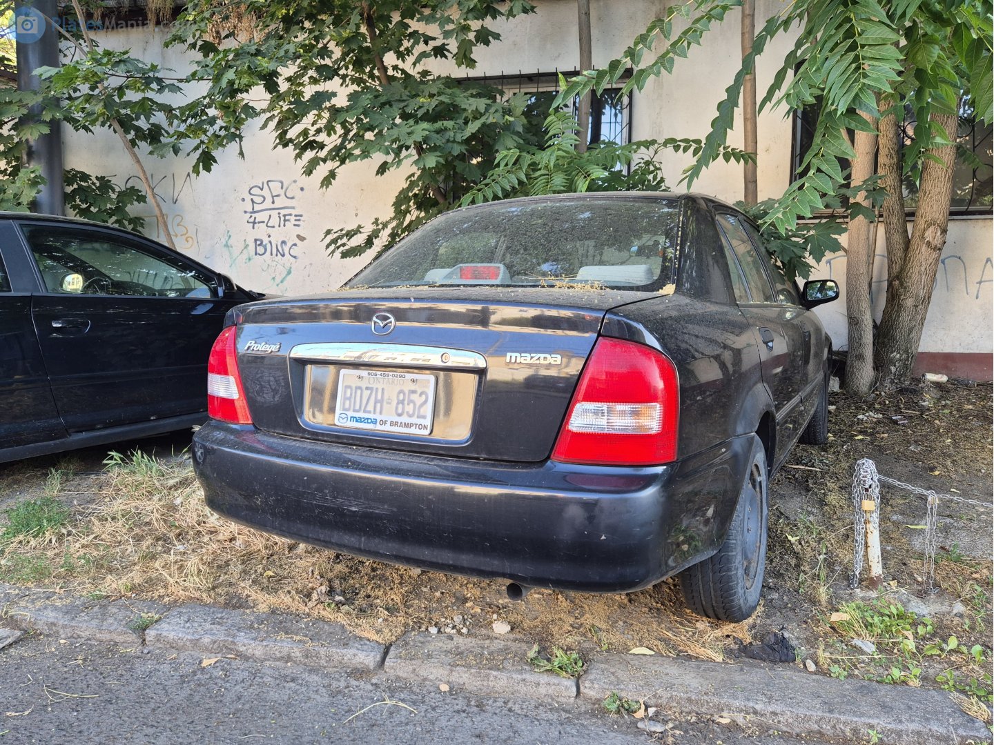 BDZH-852, Mazda Protegé 3rd gen Sedan (BJ; NA-market), facelift, 2000–2003
