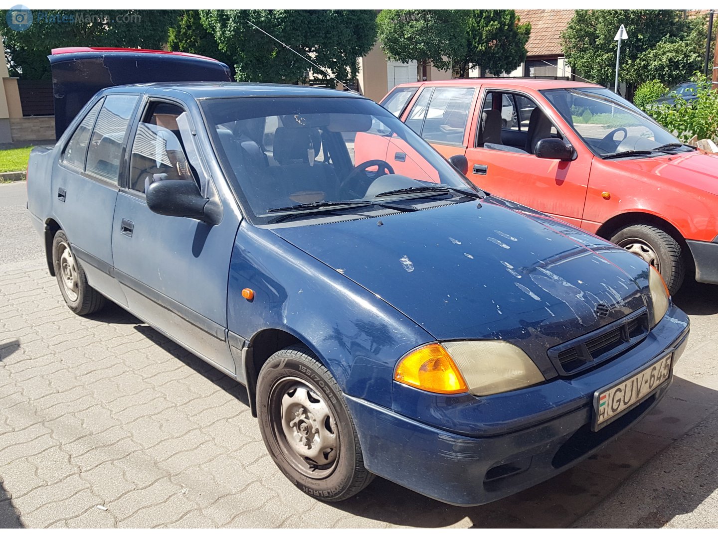 GUV-645, Suzuki Swift 2nd gen Sedan (SF), facelift, 1996–2004