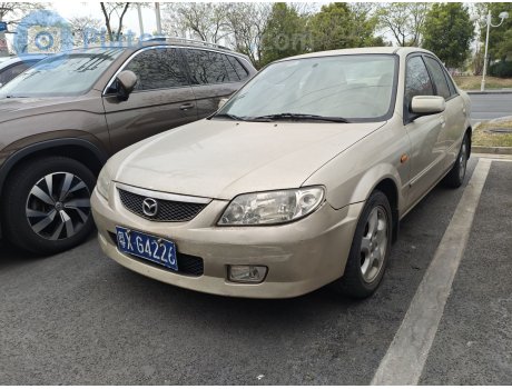 粤X·G4226, Mazda Familia