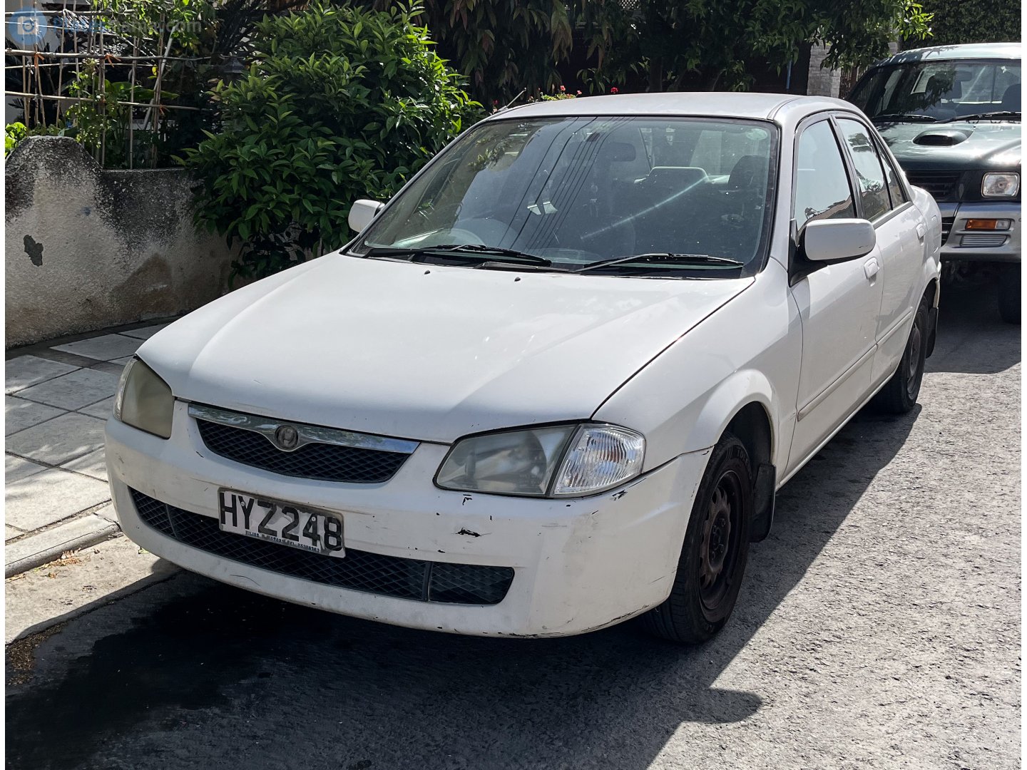 HYZ 248, Mazda Familia 8th gen Sedan (BH), 1998–2003