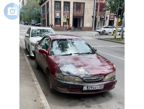 129 AXI 02, Toyota Carina ED
