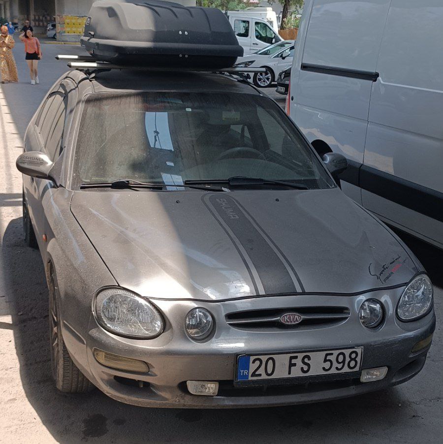 20 FS 598, Kia Shuma 1st gen (S-II), 1997–2001