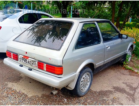 о988ае23, Mazda 323