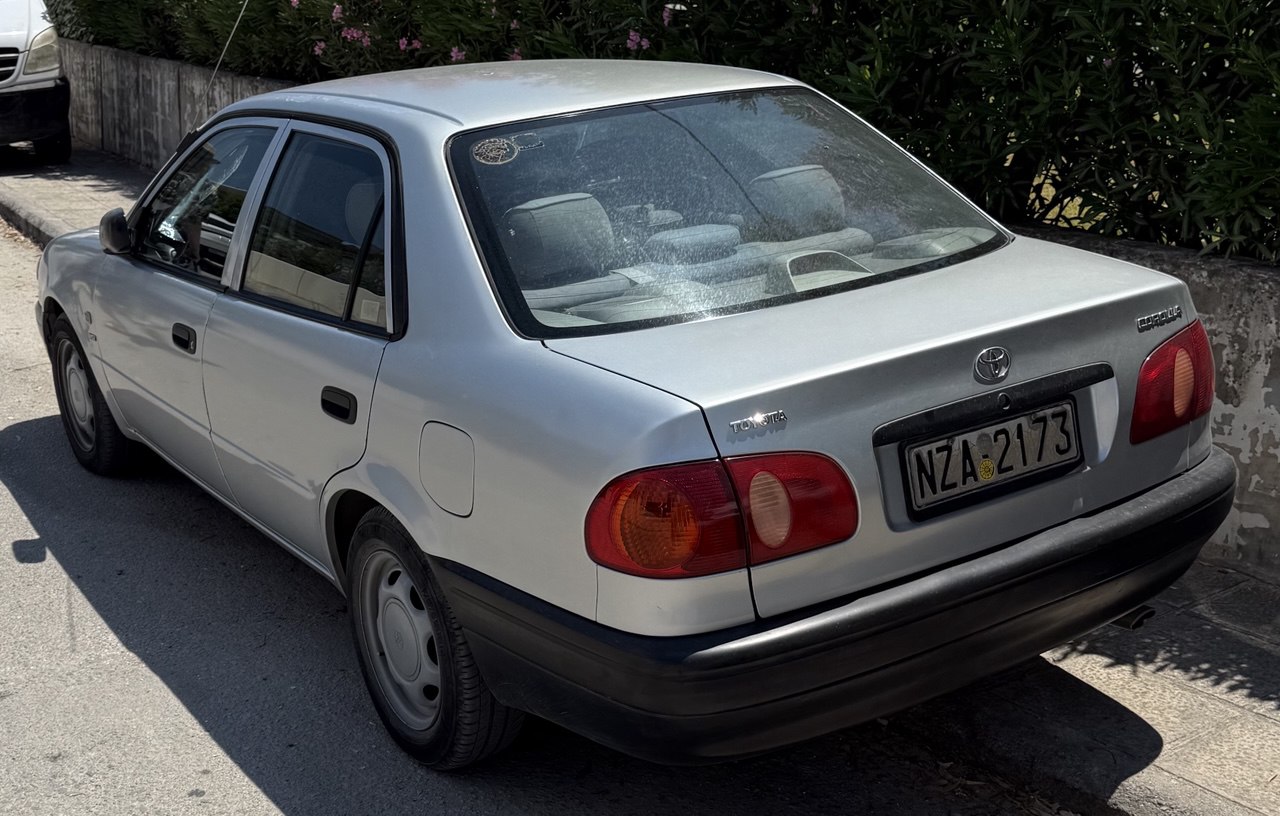 NZA-2173, Toyota Corolla 8th gen Sedan (E110; Global-market), 1995–2002