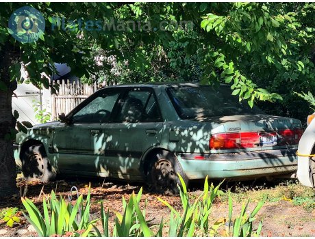 1L B8412, Mazda Protegé