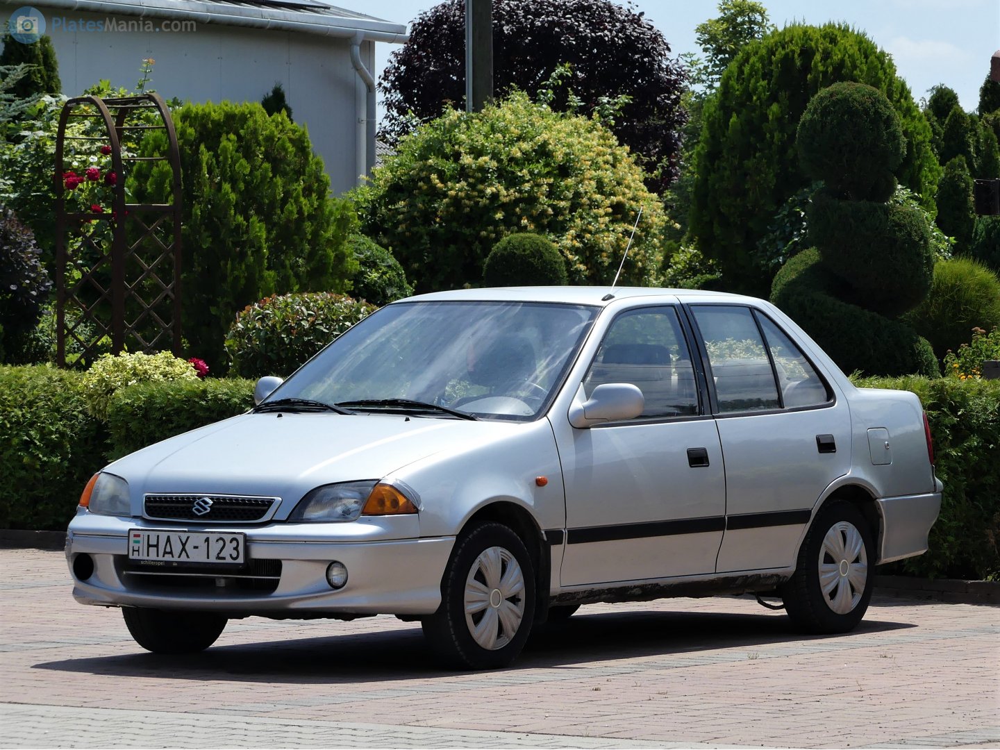 HAX-123, Suzuki Swift 2nd gen Sedan (SF), facelift, 1996–2004