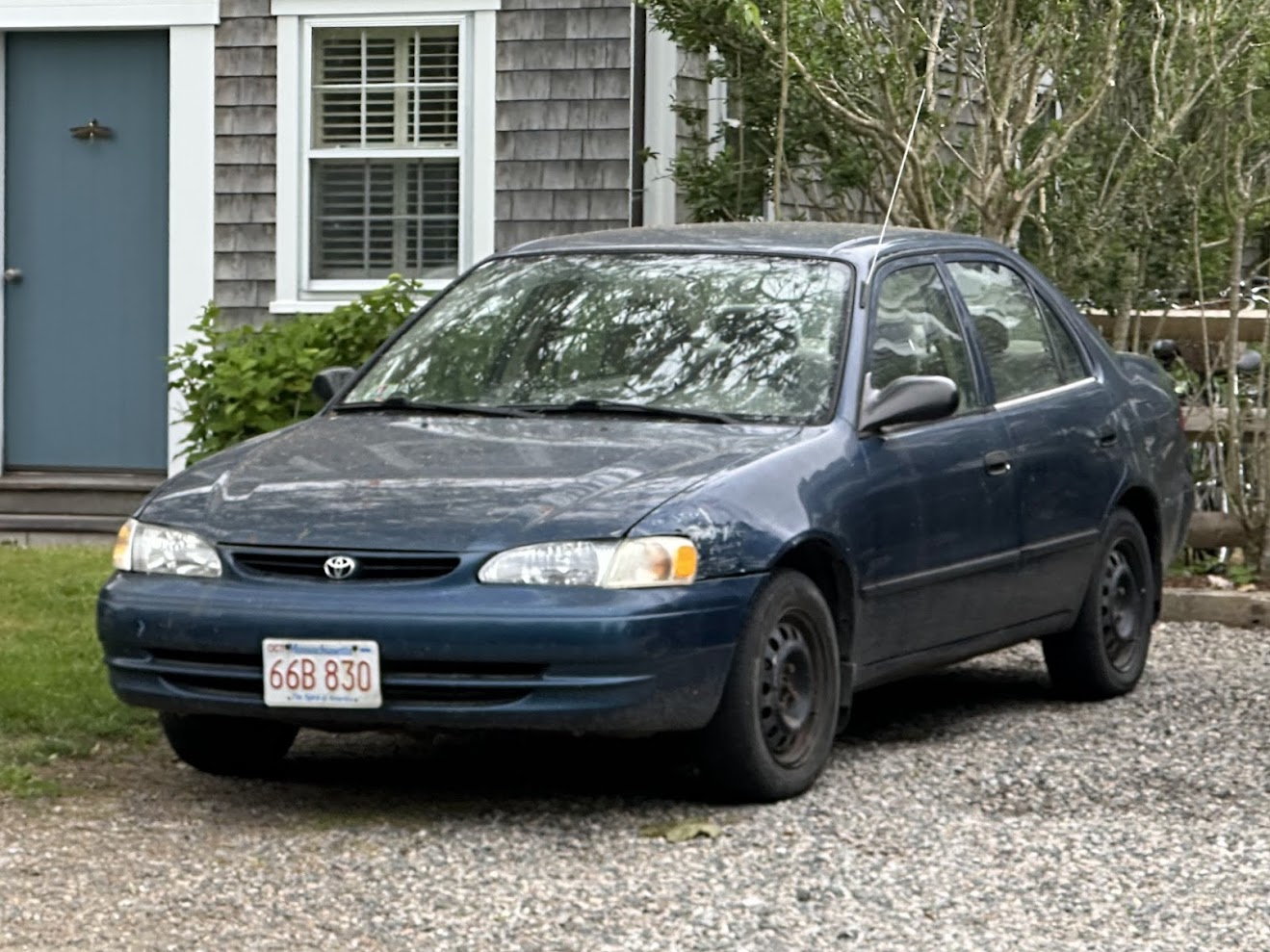66B 830, Toyota Corolla 8th gen Sedan (E110; NA-market), 1997–2001