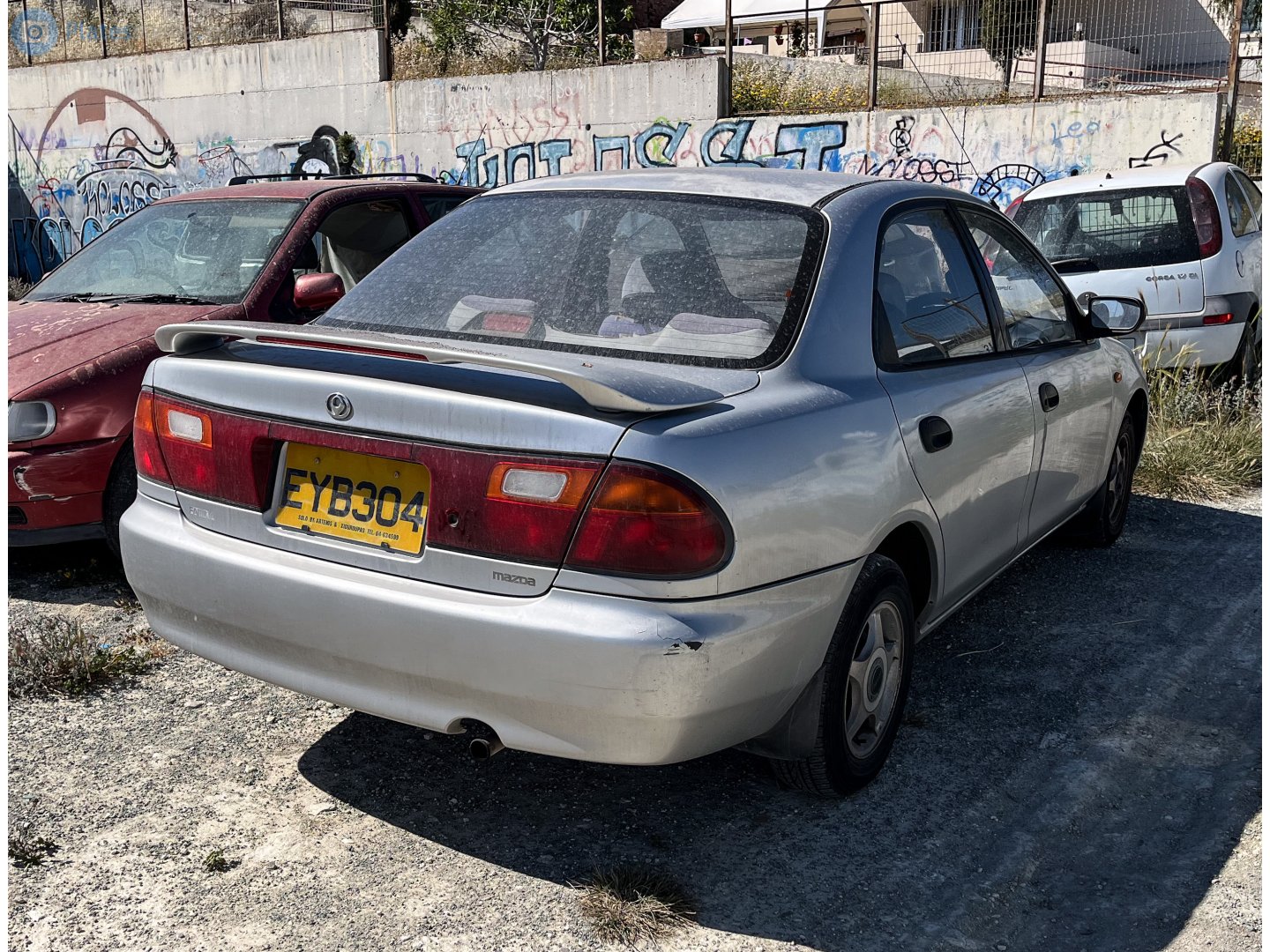 EYB 304, Mazda Familia 7th gen Sedan (BH), 1994–1998