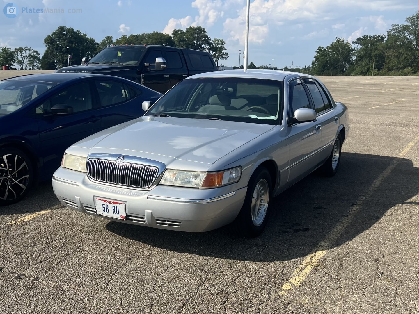 58 RU, Mercury Grand Marquis 3rd gen (EN114), 1997–2002