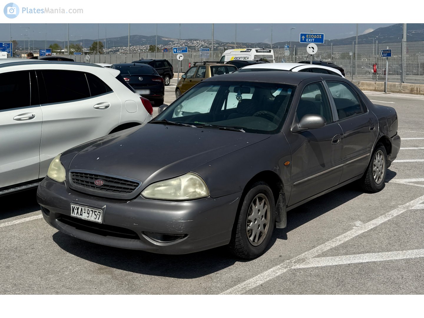 KXA-9757, Kia Clarus 1st gen Sedan (GC), facelift, 1998–2001
