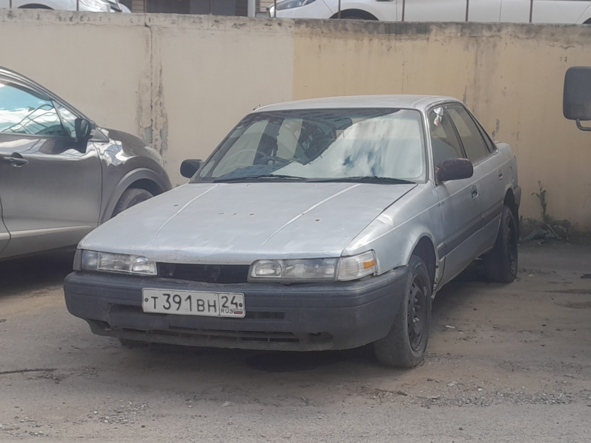 т 391 вн 24, Mazda Capella 4th gen Sedan (GD), 1987–1992