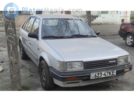 11 623-47 KE, Mazda 323