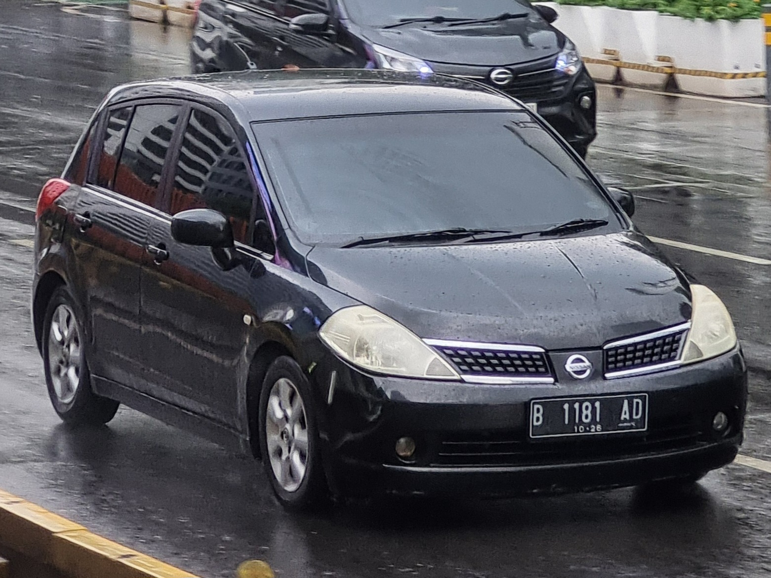 B 1181 AD, Nissan Latio 1st gen Hatch (C11; ASEAN-market), 2004–2012