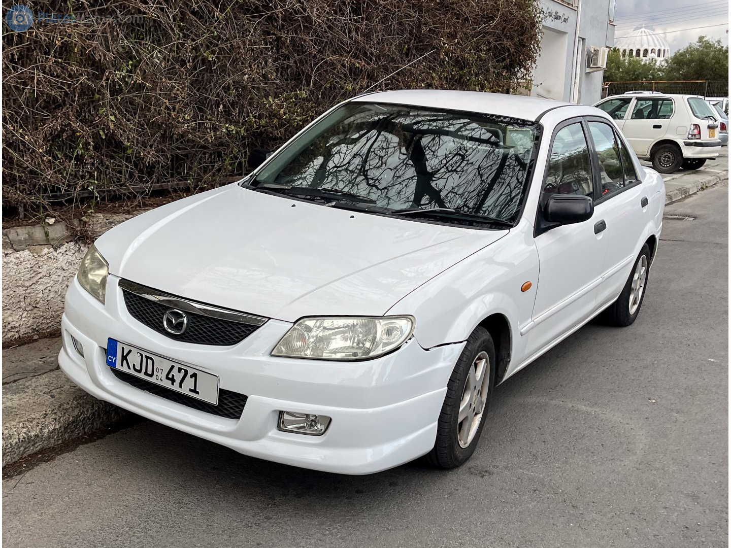 KJD 471, Mazda 323 6th gen (Protégé) Sedan (BJ), 1998–2003