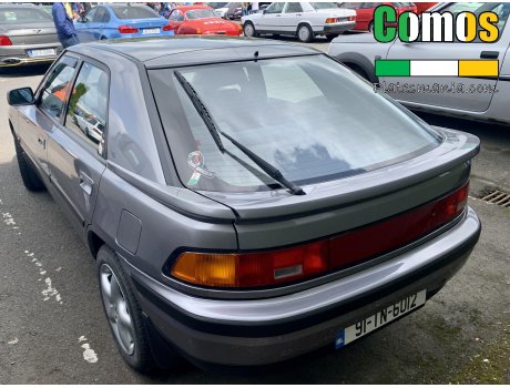 91-TN-6012, Mazda 323