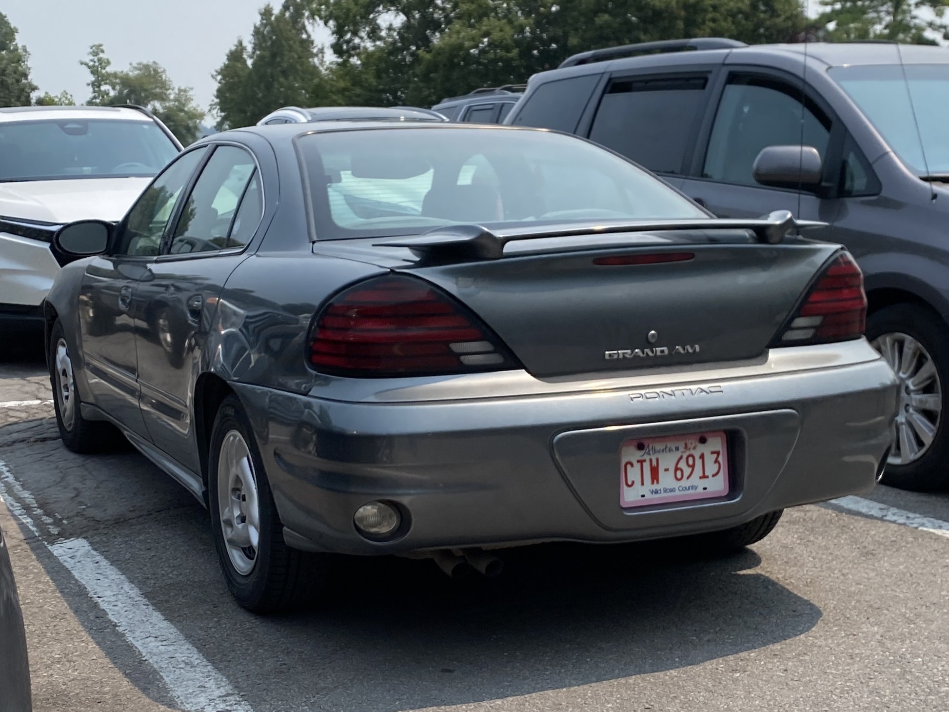 CTW-6913, Pontiac Grand Am 4th gen 4-door Sedan (N-body), facelift, 1995–1998