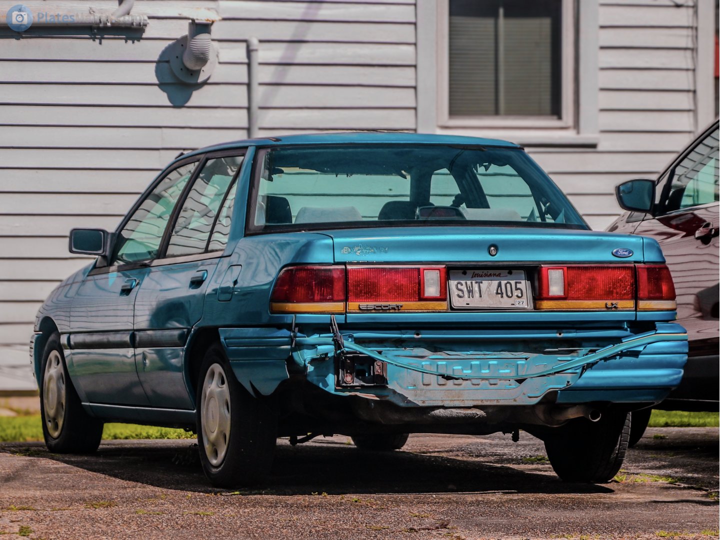 SWT 405, Ford Escort 5th gen Sedan (BG; NA-market), 1992–1996