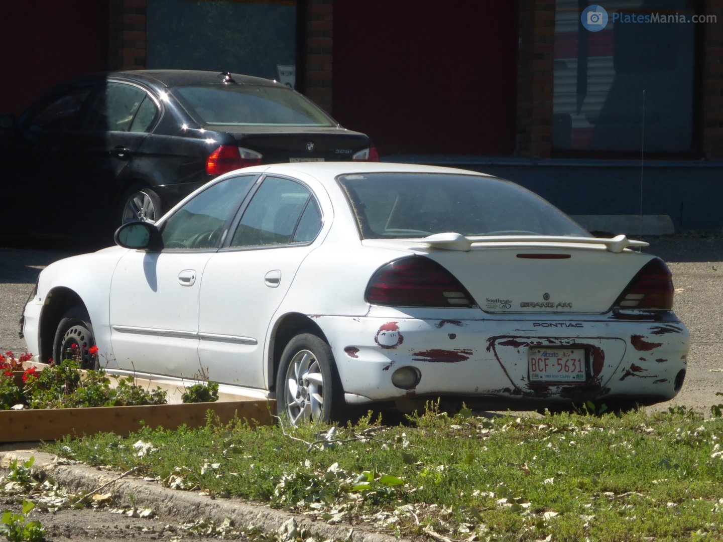 BCF-5631, Pontiac Grand Am 4th gen 4-door Sedan (N-body), facelift, 1995–1998