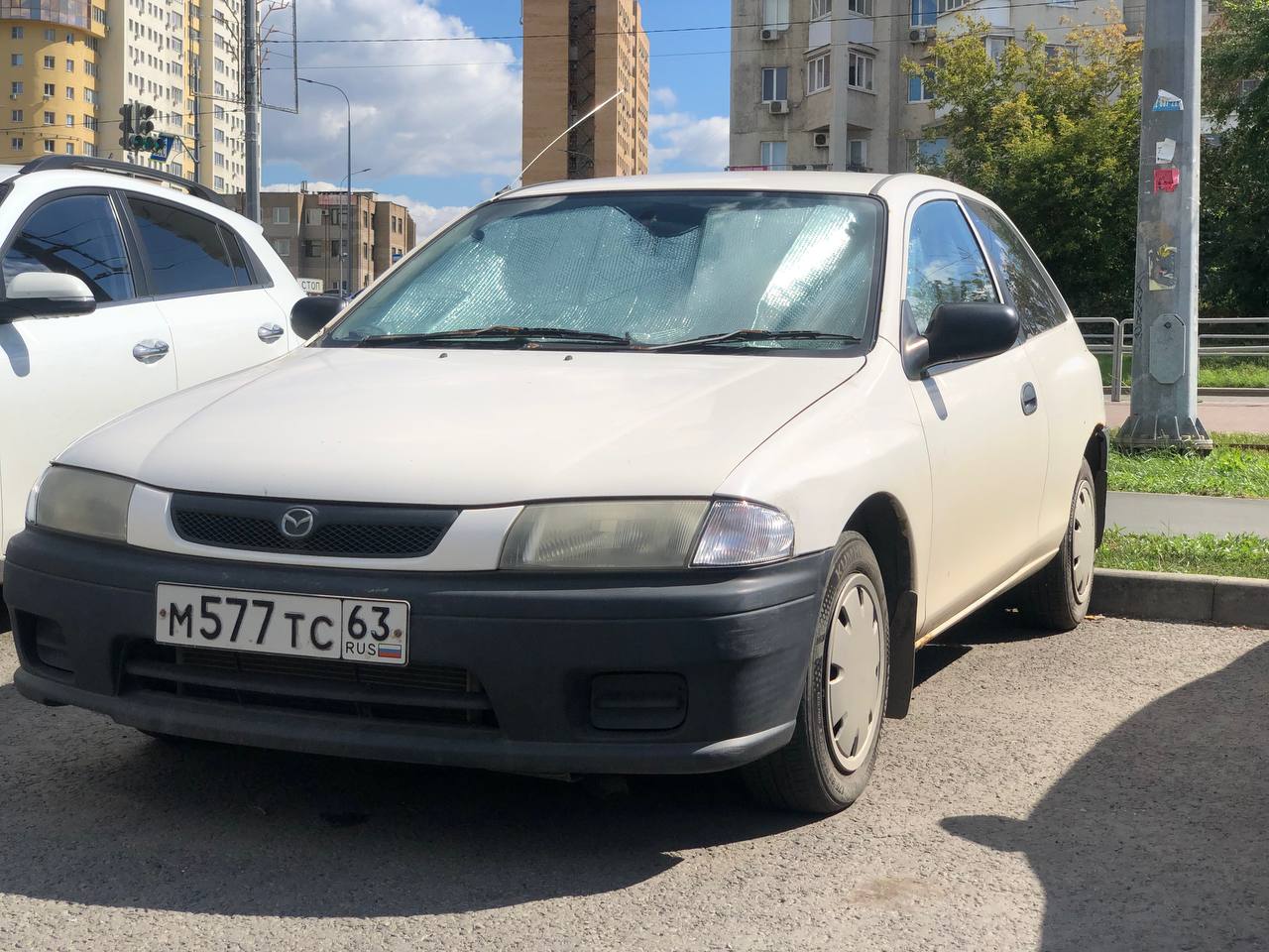 м 577 тс 63, Mazda Familia 7th gen Hatch (BH), 1996–1998
