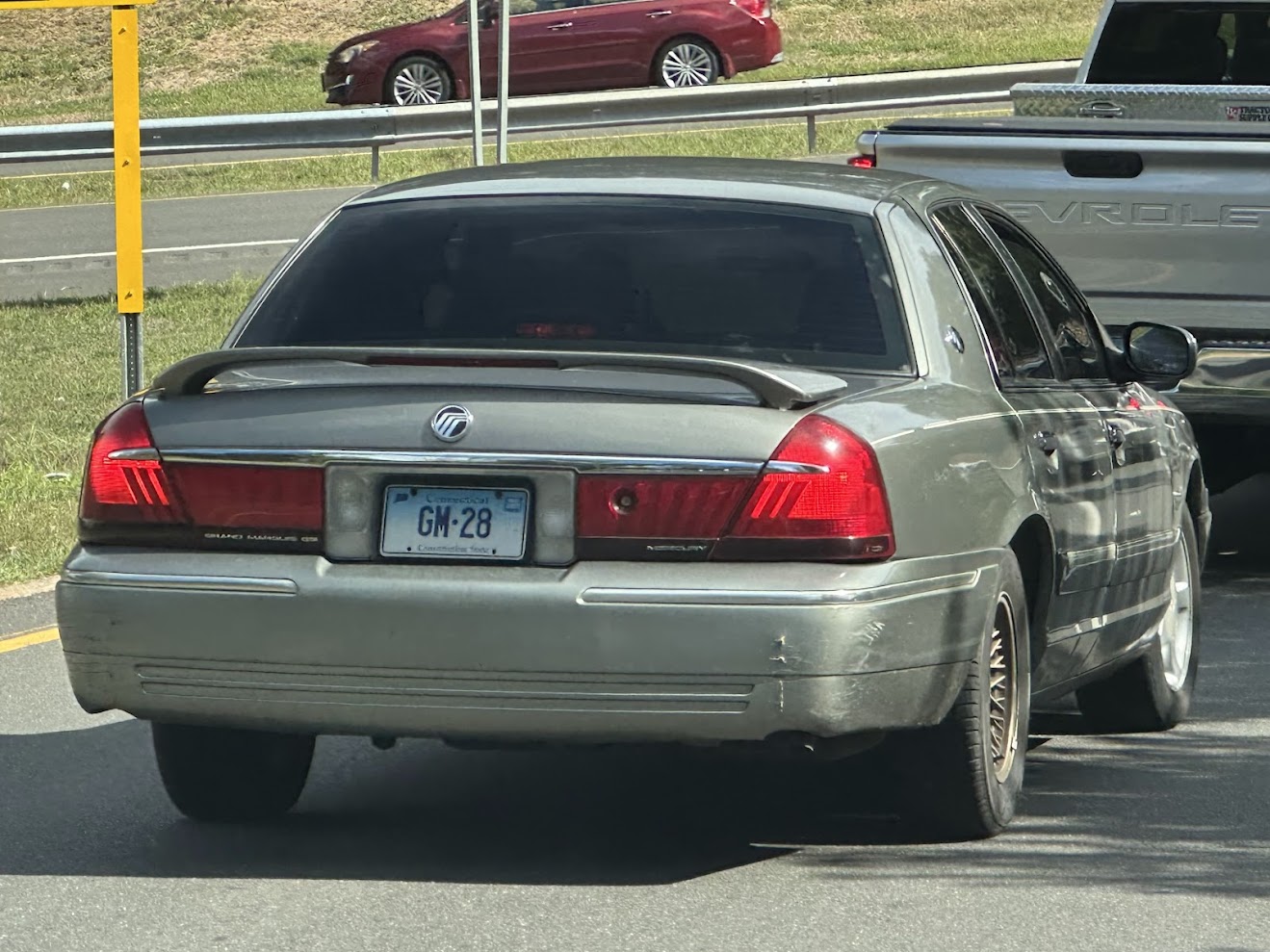 GM-28, Mercury Grand Marquis 3rd gen (EN114), 1997–2002