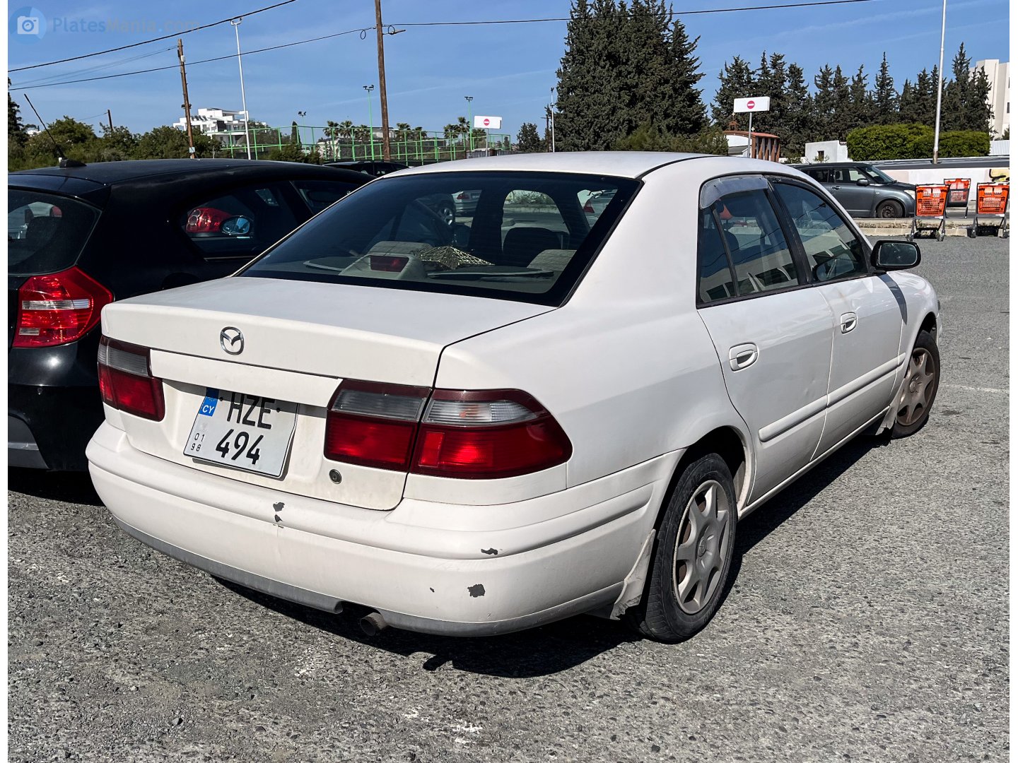 HZE 494, Mazda Capella 6th gen Sedan (GF), 1997–2002