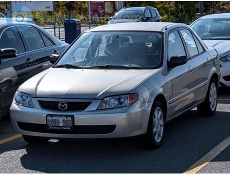 AKNH-946, Mazda Protegé