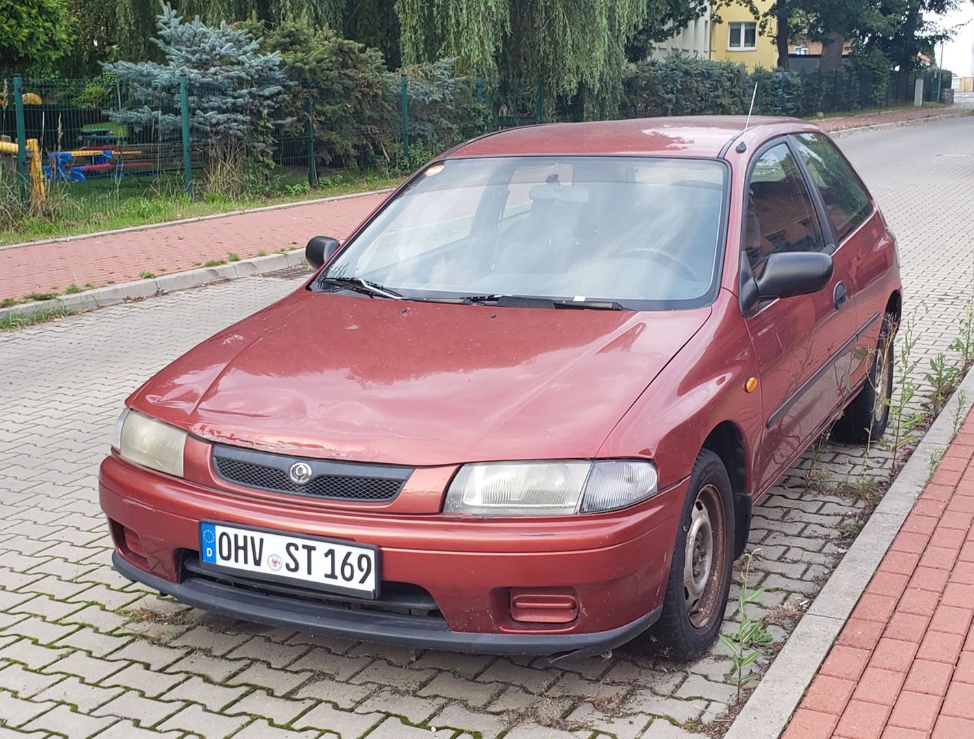 OHV ST 169, Mazda 323 5th gen P 3-door Hatch (BA), 1997–2000