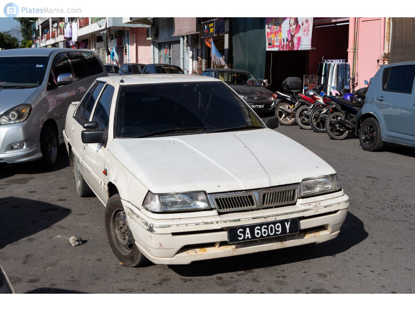 SA 6609 Y, Proton Saga 1st gen Iswara Sedan (C21A/C22A), 1st facelift, 1992–2003