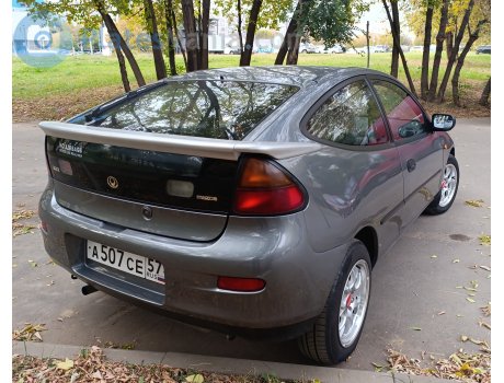 а507се57, Mazda 323