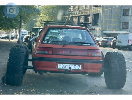 8611 TC-7, Mazda 323