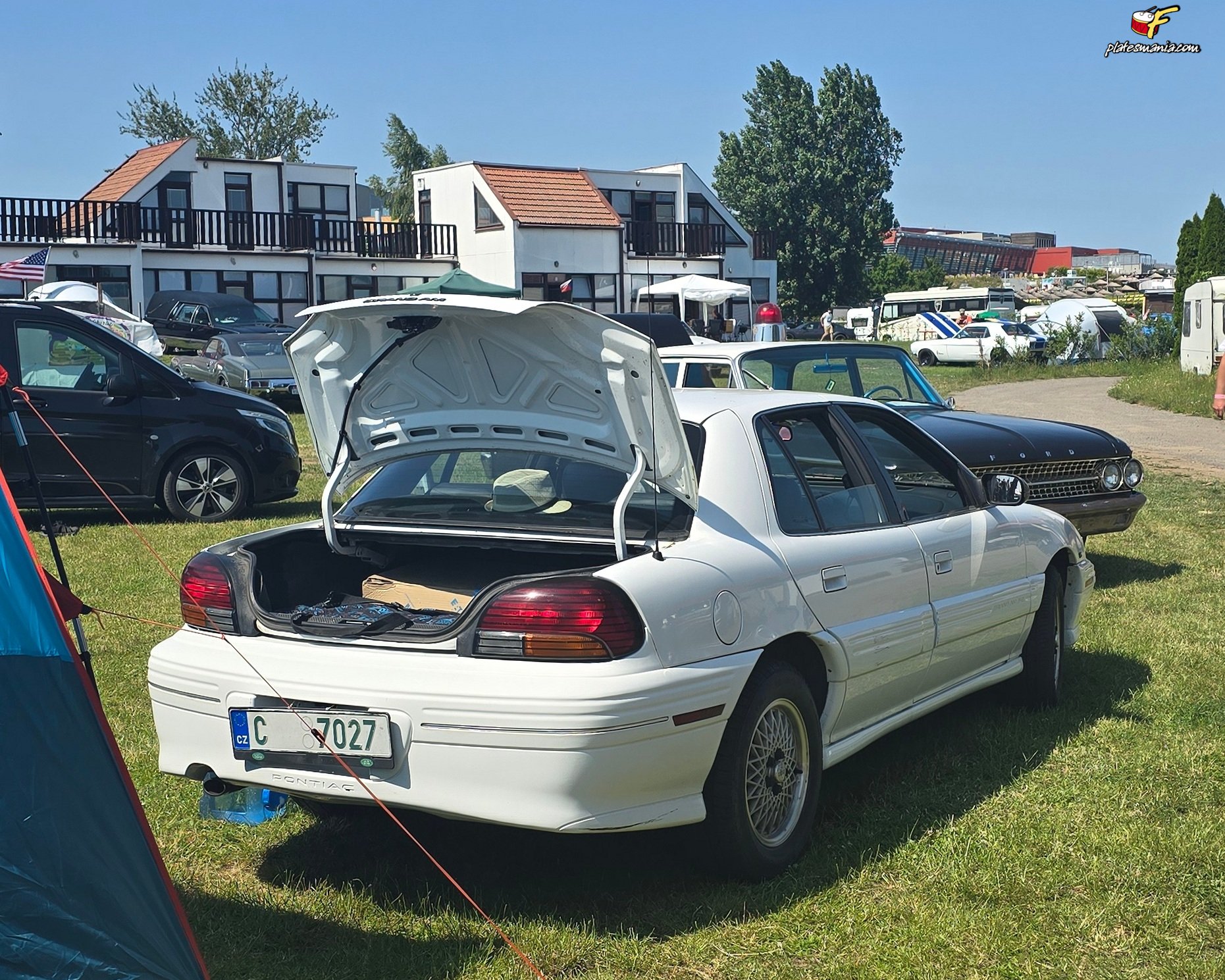 C 7027, Pontiac Grand Am 4th gen 4-door Sedan (N-body), facelift, 1995–1998