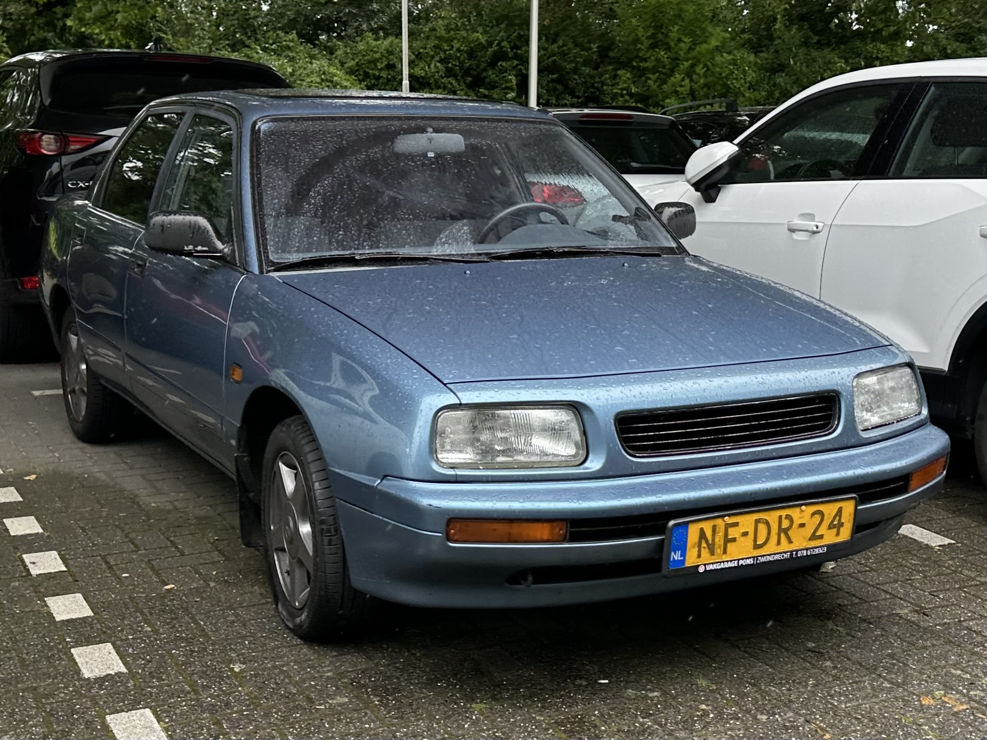 NF-DR-24, Daihatsu Applause 1st gen (A100), 1989–1997