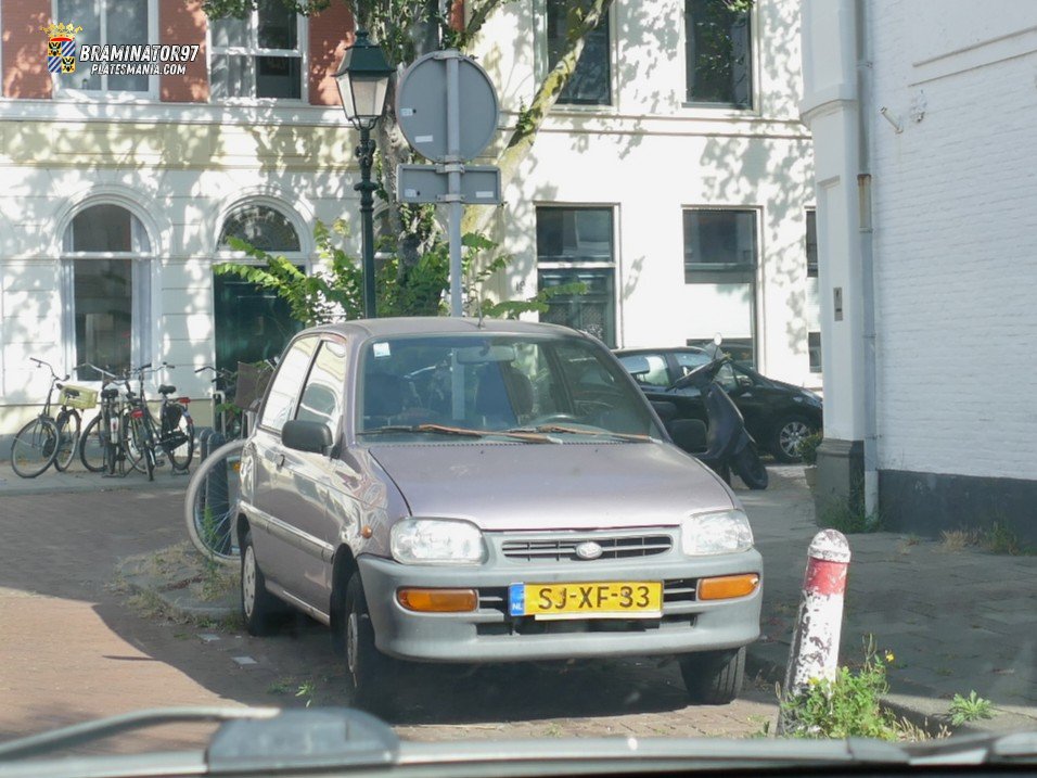 SJ-XF-33, Daihatsu Cuore 5th gen 3-door Hatch (L501), 1995–1999