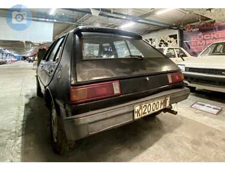 к 2000 МТ, Mitsubishi Mirage