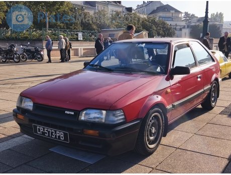 CP-573-PB, Mazda 323