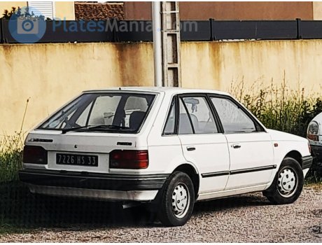 7226 HS 33, Mazda 323