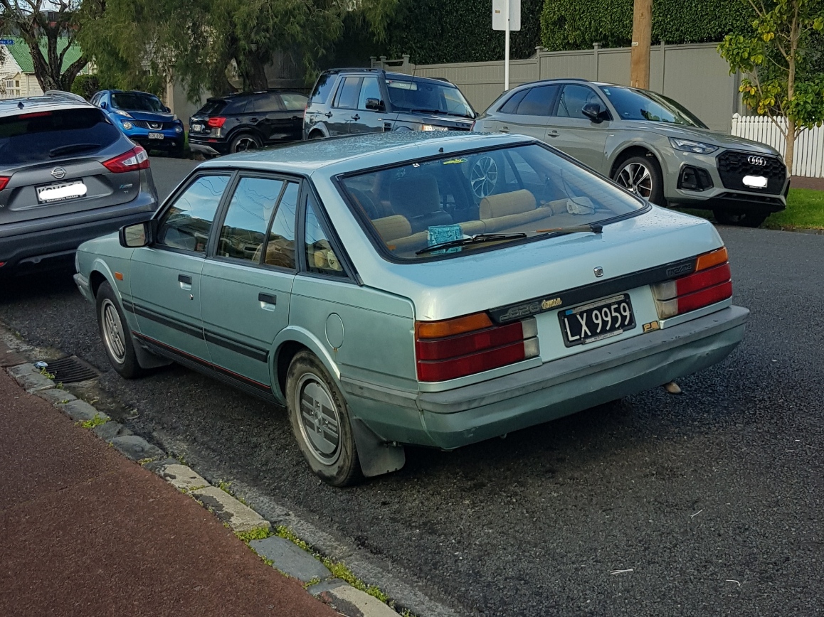 LX9959, Mazda 626 2nd gen Liftback (GC), 1983–1987