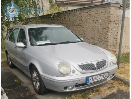 KN-877EM, Lancia Lybra