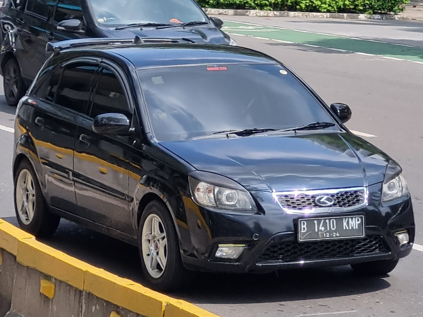 B 1410 KMP, Kia Pride 2nd gen Hatch (JB; KR-market), facelift, 2009–2011