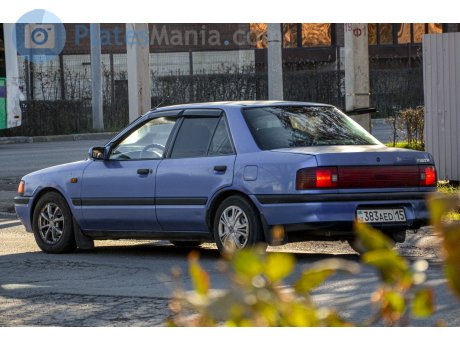 383 AED 15, Mazda 323