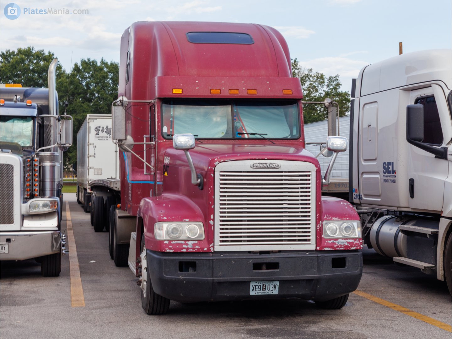 XE9 03K, Freightliner FLD Conventional, 1990–2010
