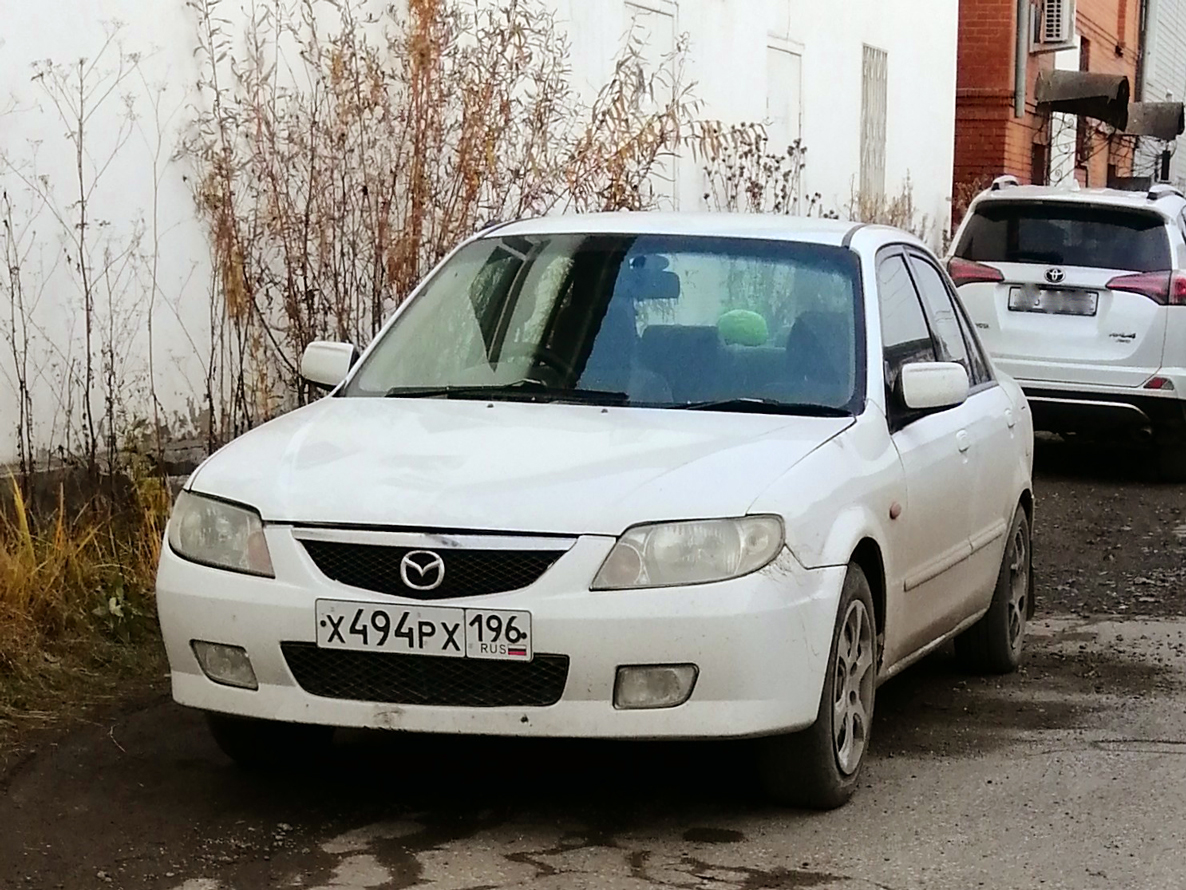 х 494 рх 196, Mazda Familia 8th gen Sedan (BH), 1998–2003
